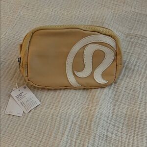 lululemon athletica Tan and White Crossbody Bag